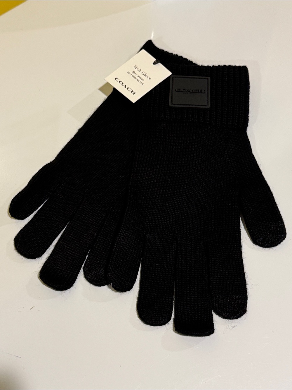 Coach Black Tech Knit gloves.